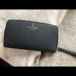 Black leather Kate Spade wallet with zip